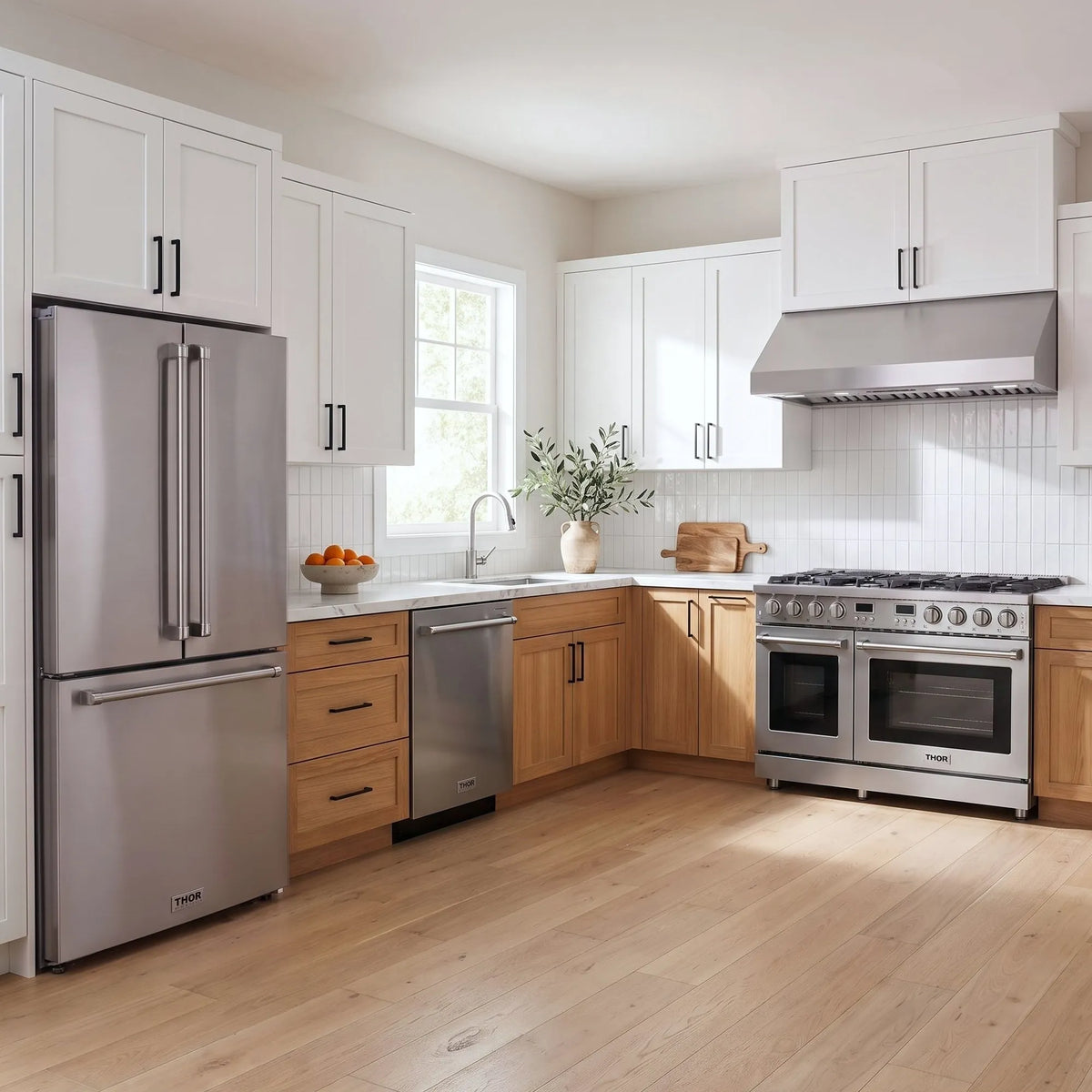 Thor Kitchen A-Series stainless steel kitchen with a 48-inch gas range, under-cabinet hood, French door refrigerator, dishwasher