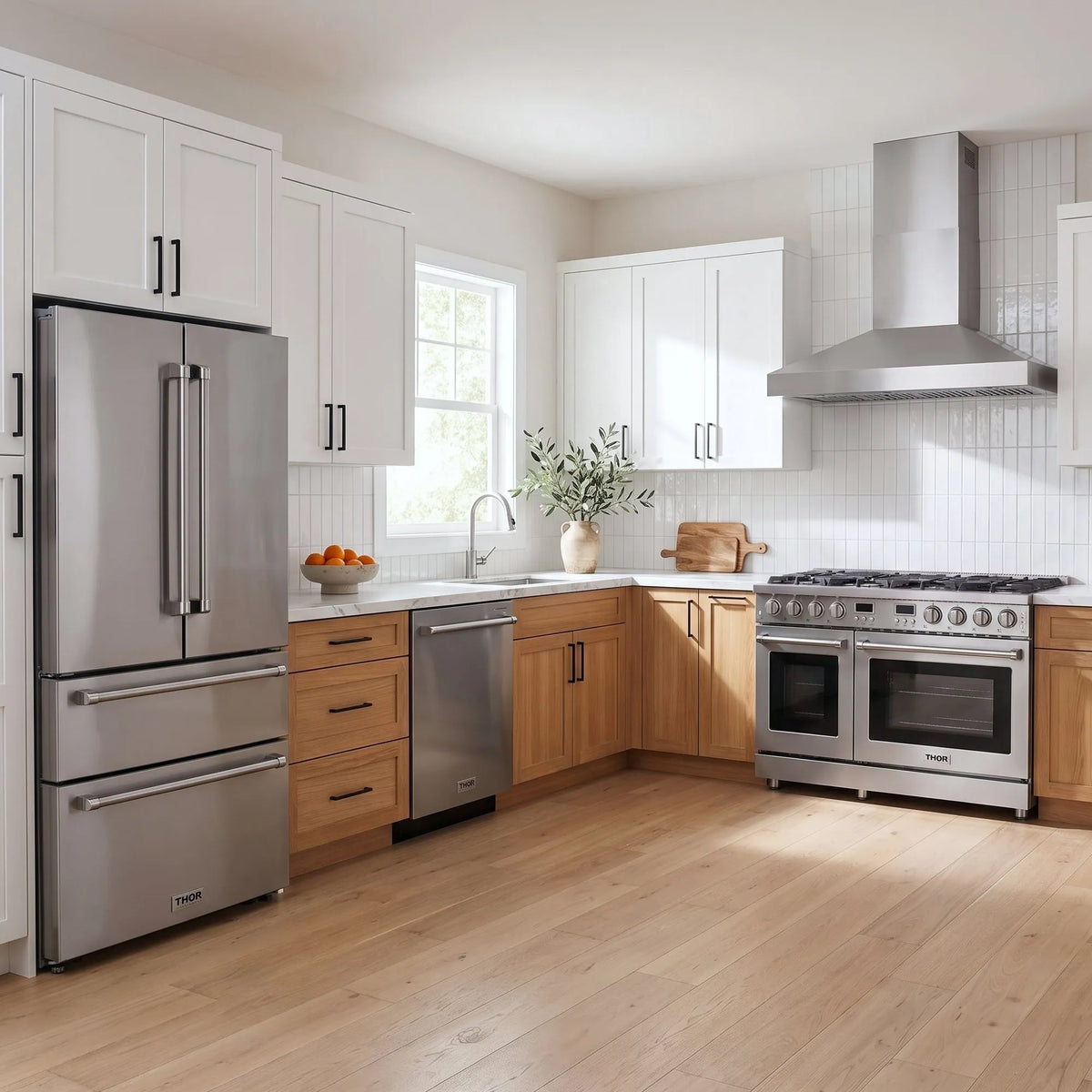 Thor Kitchen A-Series stainless steel kitchen with a 48-inch gas range, wall-mount chimney hood, French door refrigerator, dishwasher