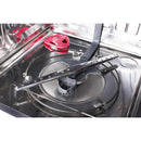 Dishwasher wash chamber with stainless racks, spray arm, and central wash parts