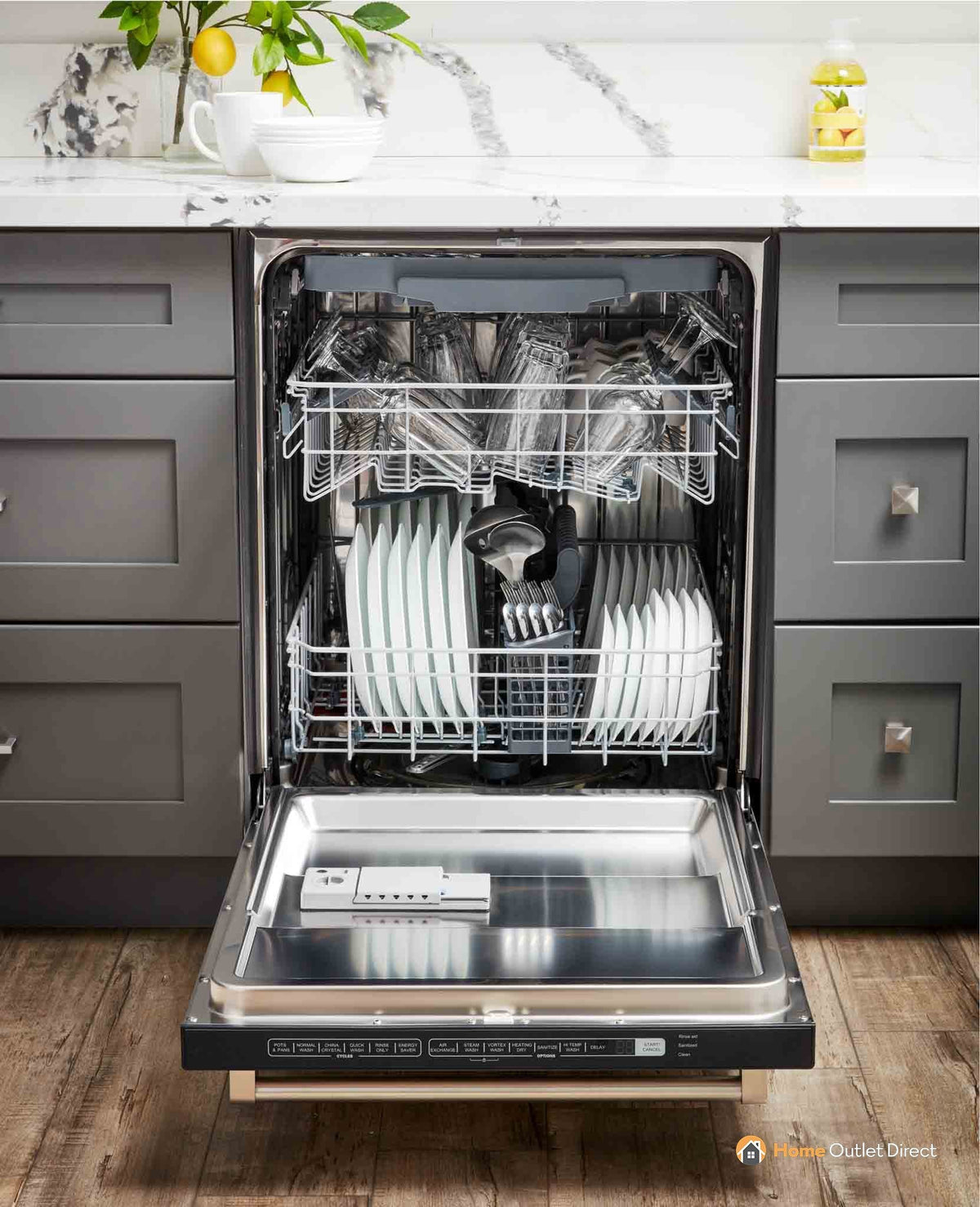 Stainless steel built-in dishwasher open, with top and bottom racks loaded with dishes.