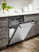 Built-in dishwasher open with spray-wash area and racks loaded with dishes