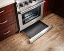 Stainless steel gas range with pull-out storage drawer/broiler pan compartment open