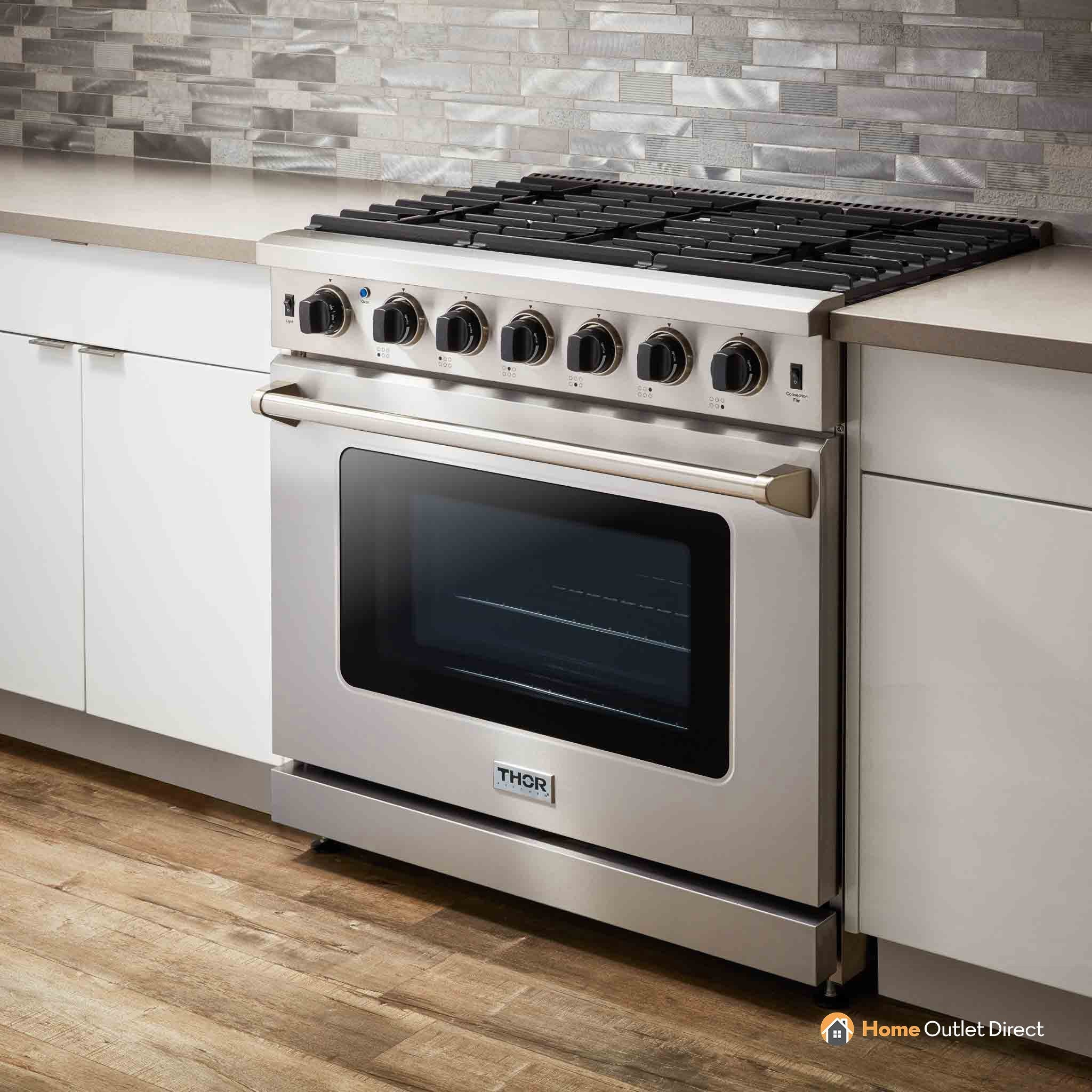 Stainless steel gas range with cooktop burners and oven window door
