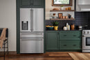 Stainless steel French door refrigerator with water dispenser and freezer drawer