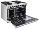 Double oven gas range with one oven door open and interior racks visible