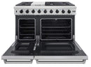 Stainless steel double oven gas range with oven doors open and black oven interiors