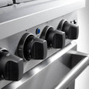 Stainless steel gas range control knobs on front panel with burner labels