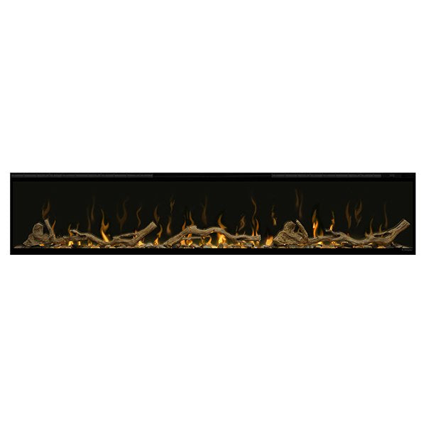 Linear fireplace insert with glowing flames and driftwood log and river rock set