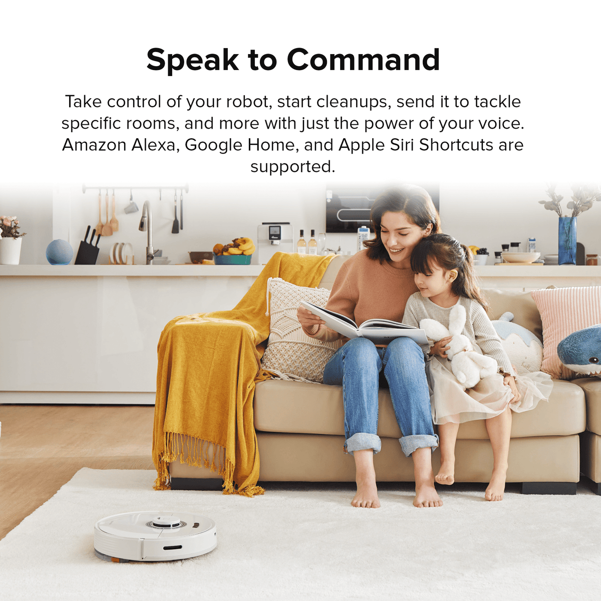 Robot vacuum and mop on the floor with a family relaxing on a couch in the background