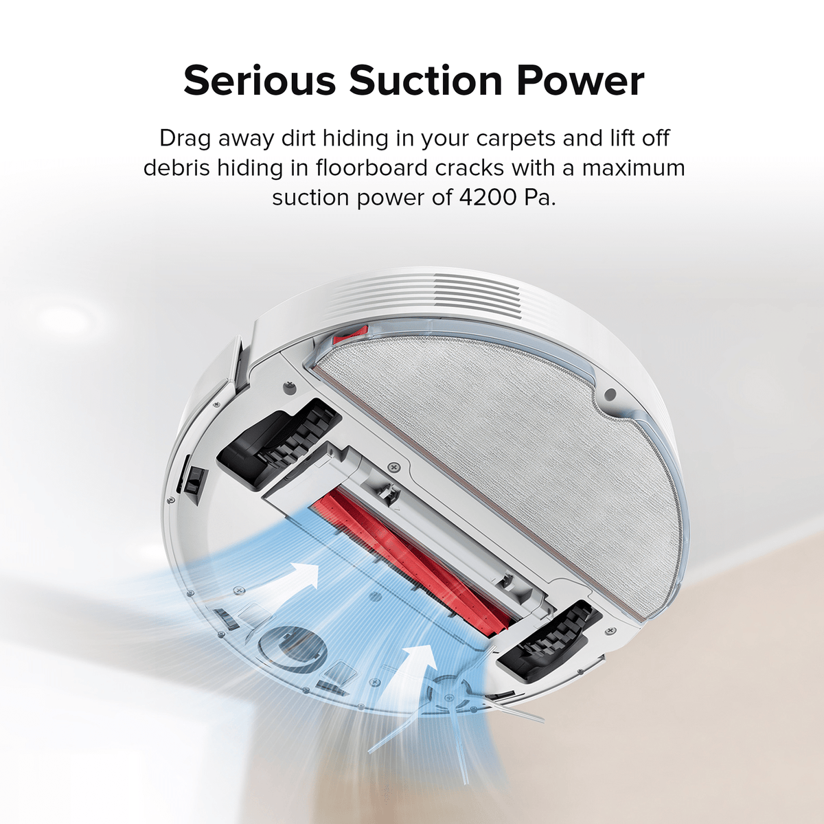 White Roborock robot vacuum and mop underside showing brush and suction airflow