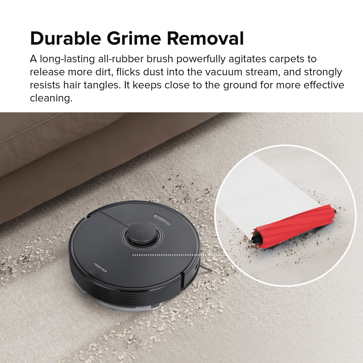 Black Roborock robot vacuum and mop with all-rubber brush on carpet edge