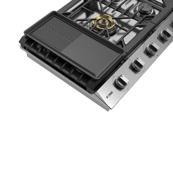 Fotile reversible griddle installed on two-burner cooktop, ridged tray insert over burners