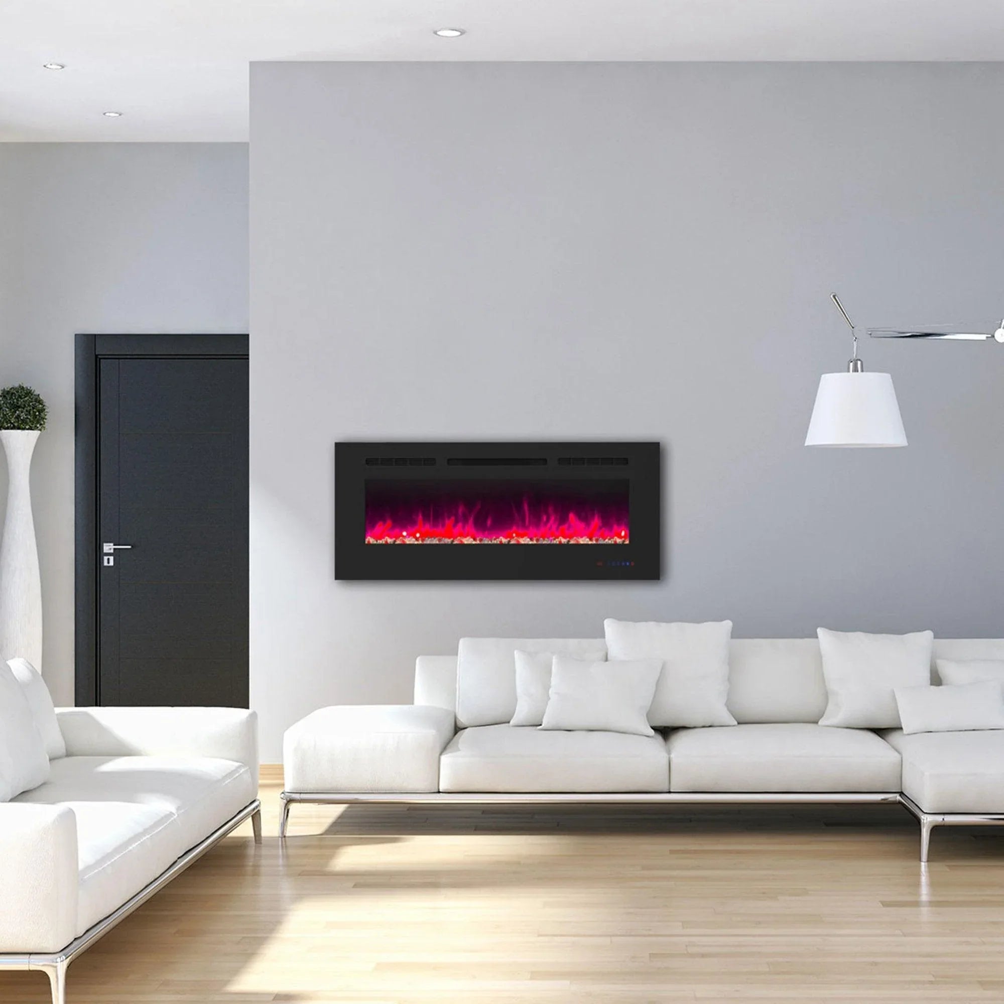 Black electric fireplace with red flame effect mounted in a bright living room