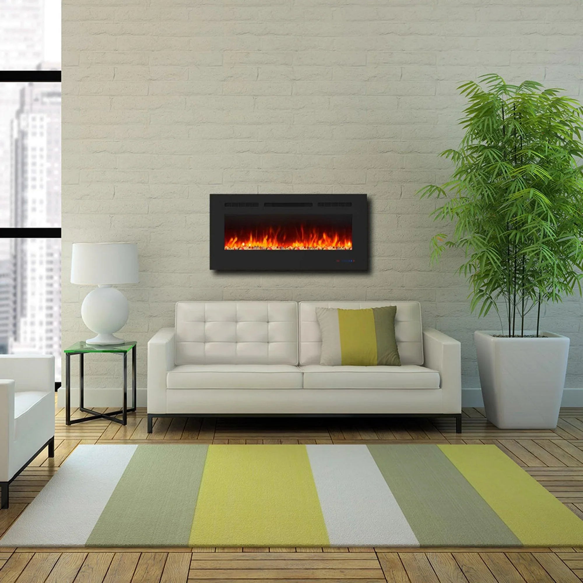 Wall-mounted black electric fireplace with orange flame effect above a white sofa