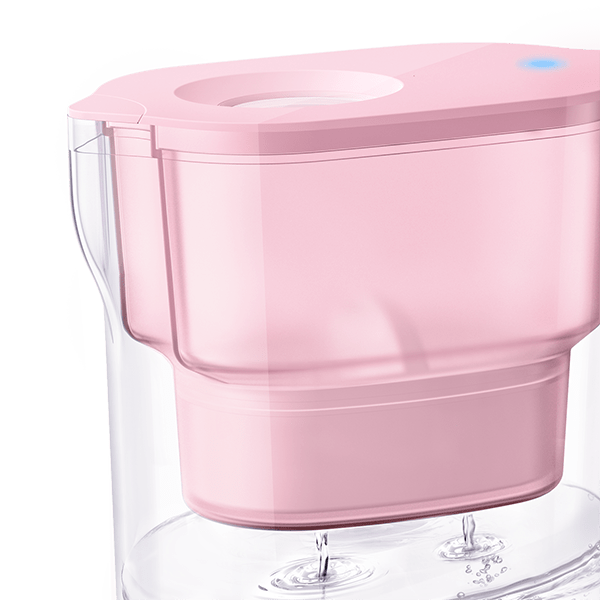 Pink water filter pitcher close-up showing flip-top lid and spout