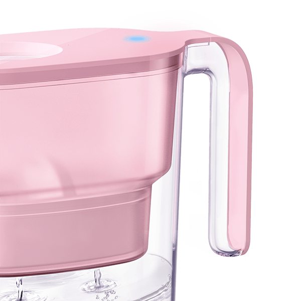 Pink water filter pitcher side view showing flip-top lid and clear spout