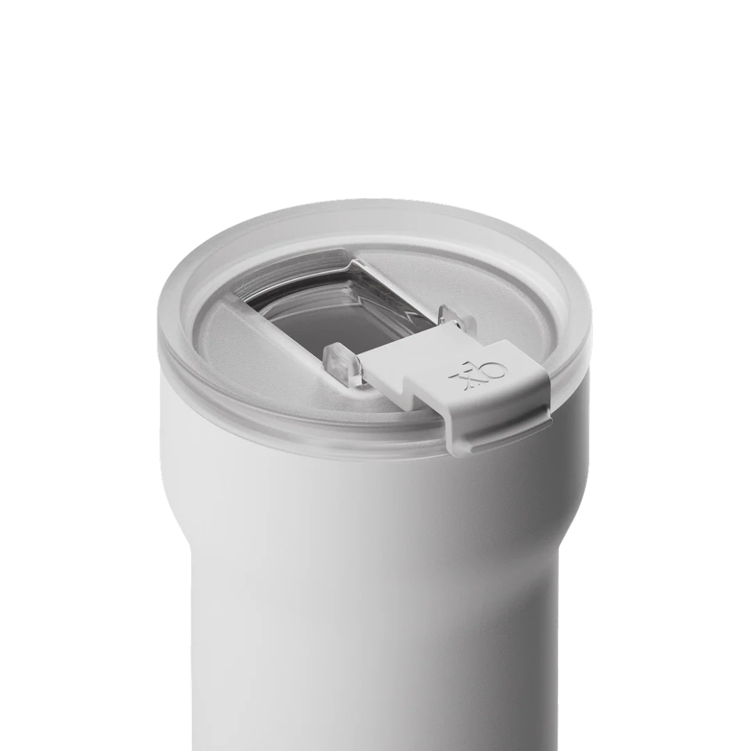 White passenger tumbler lid close-up with flip-top mechanism and latch