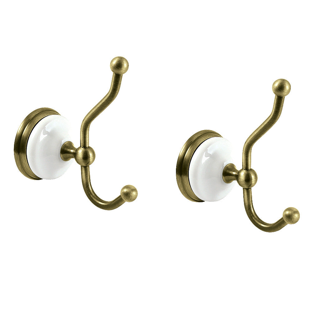Victorian double robe hook set with antique brass hooks and white round backplates