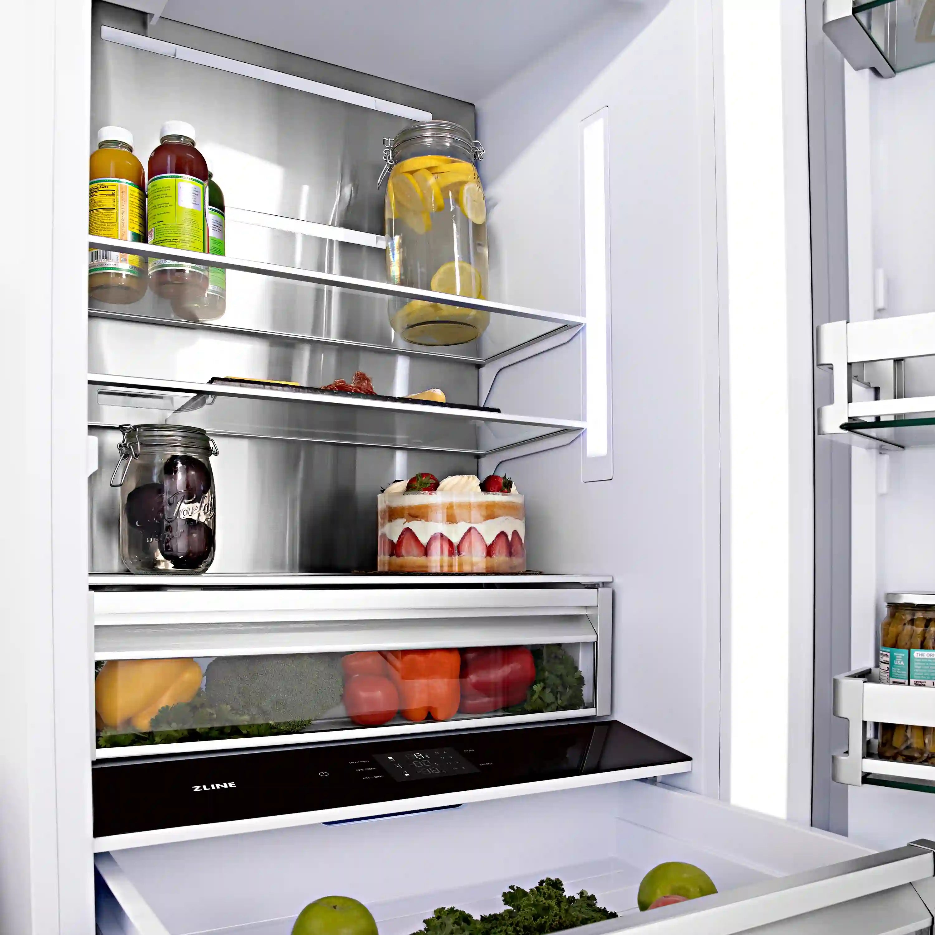 Refrigerator interior with adjustable shelves, door bins, and bottom crisper drawer