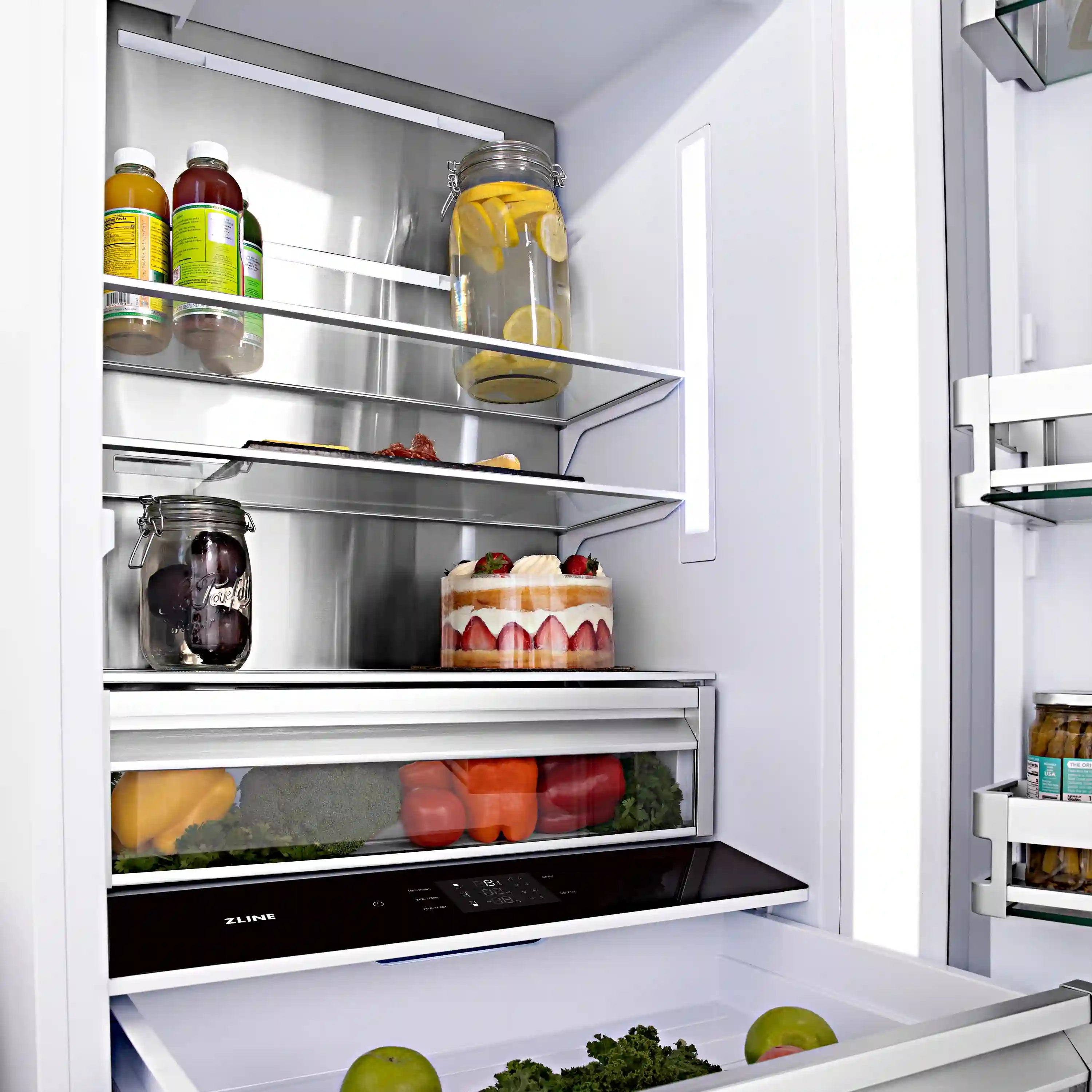 Refrigerator interior with shelves holding bottles, containers, and fresh produce