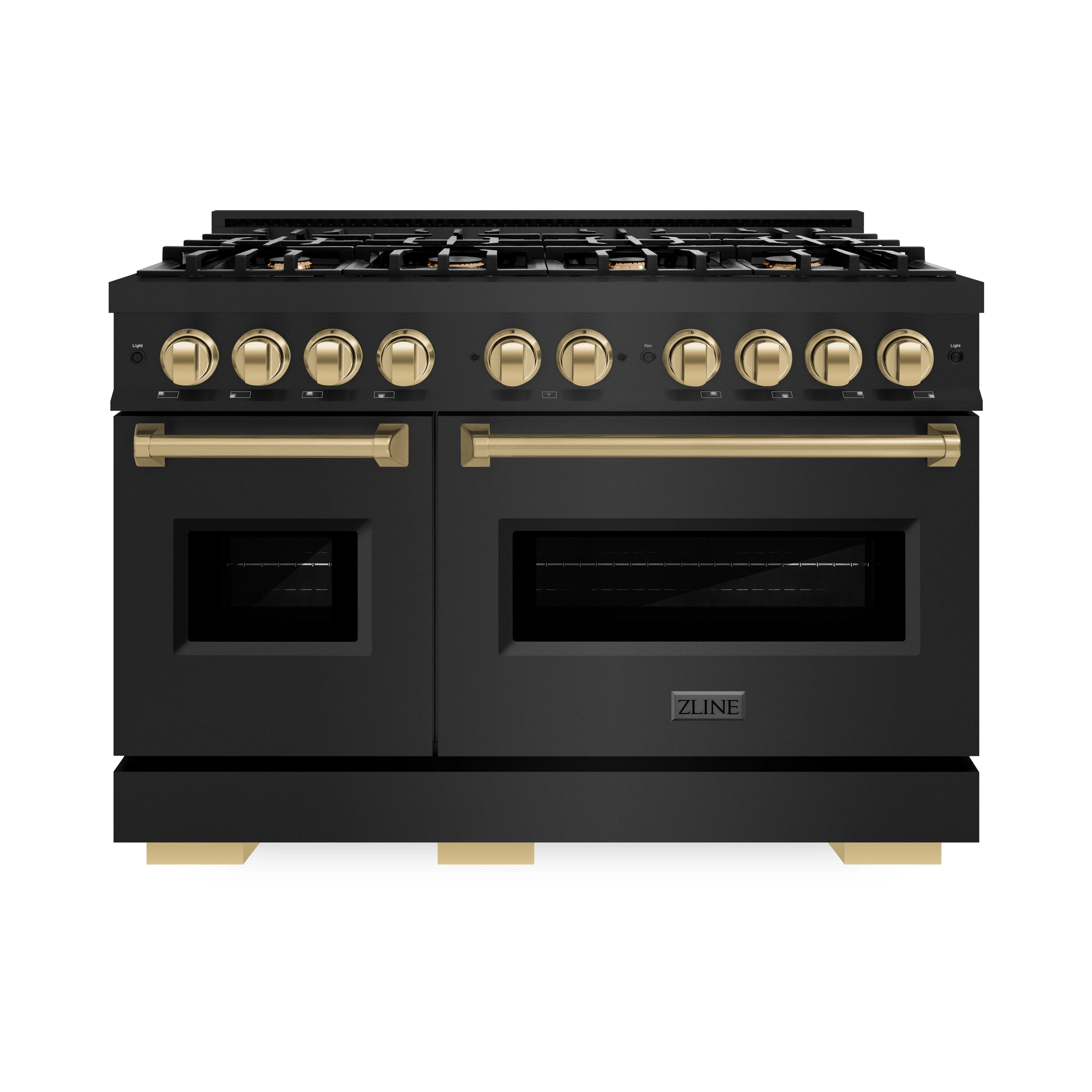Black gas double-oven range with champagne bronze control knobs and gold handles