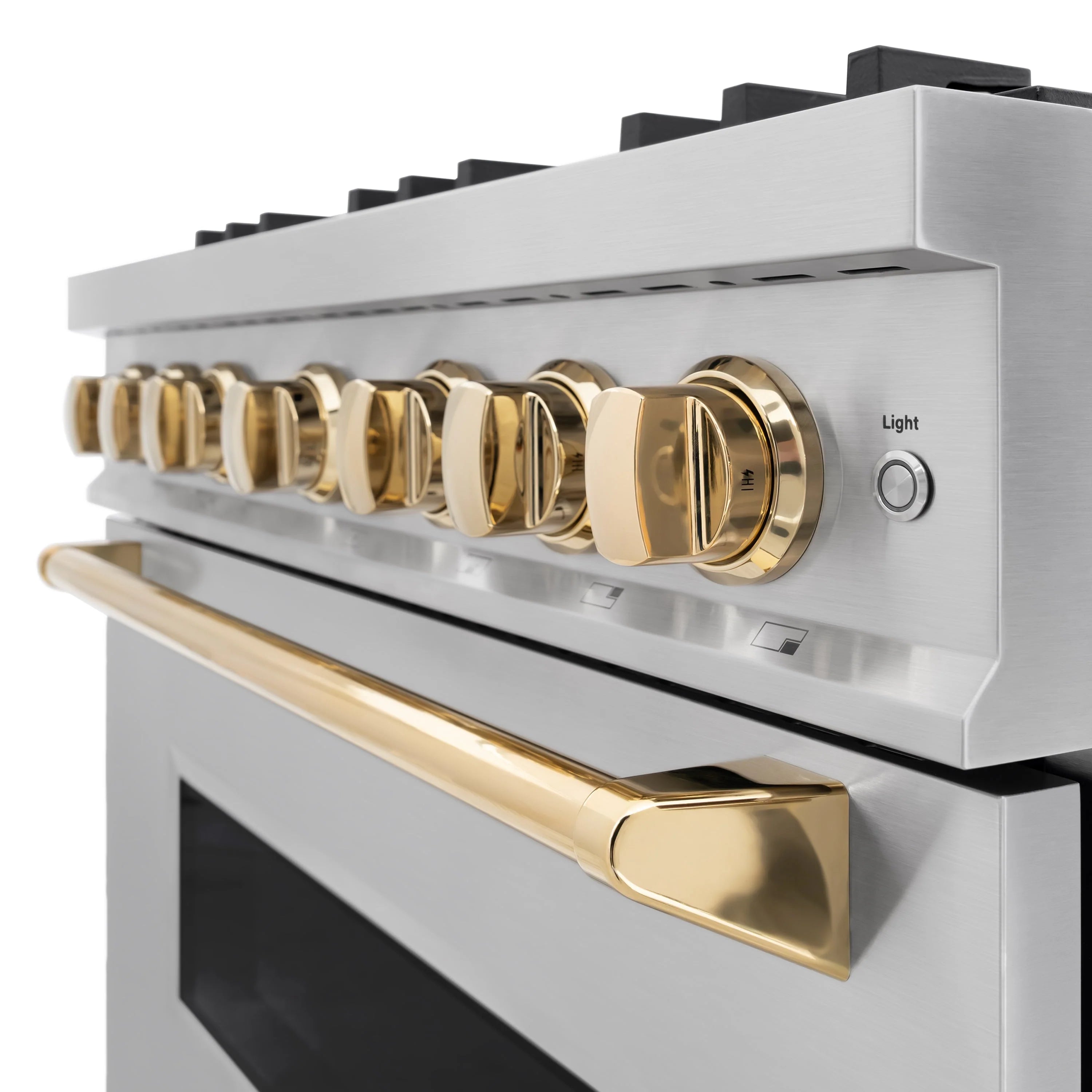 Gas range control panel with gold knobs and polished gold oven handle