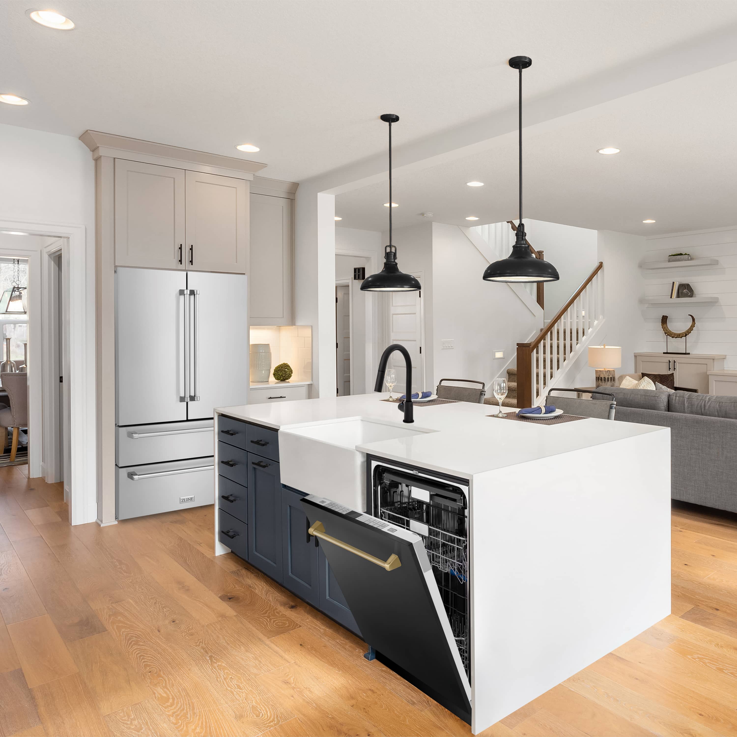 Black stainless appliance package with refrigerator, dishwasher, and cabinet drawers