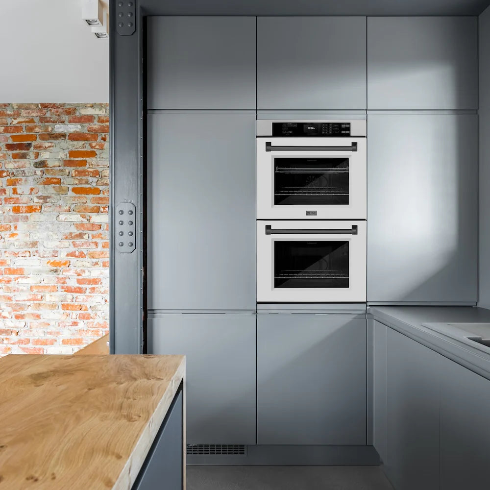 Built-in double wall oven with white matte doors, black handles, and satin stainless trim