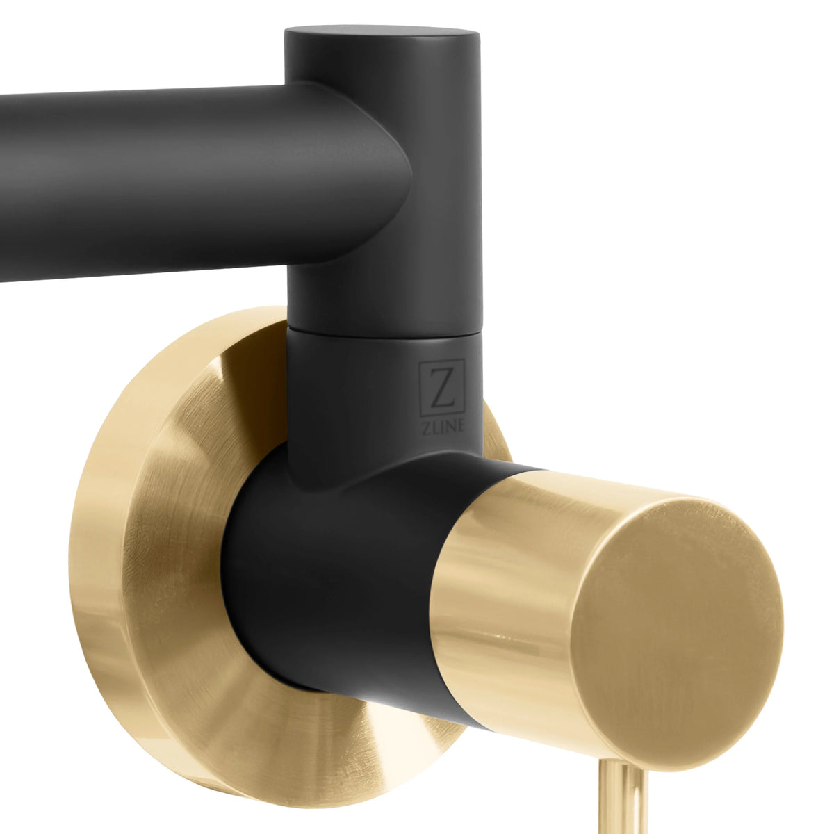 Matte black pot filler elbow and round wall plate with champagne bronze outlet tube.