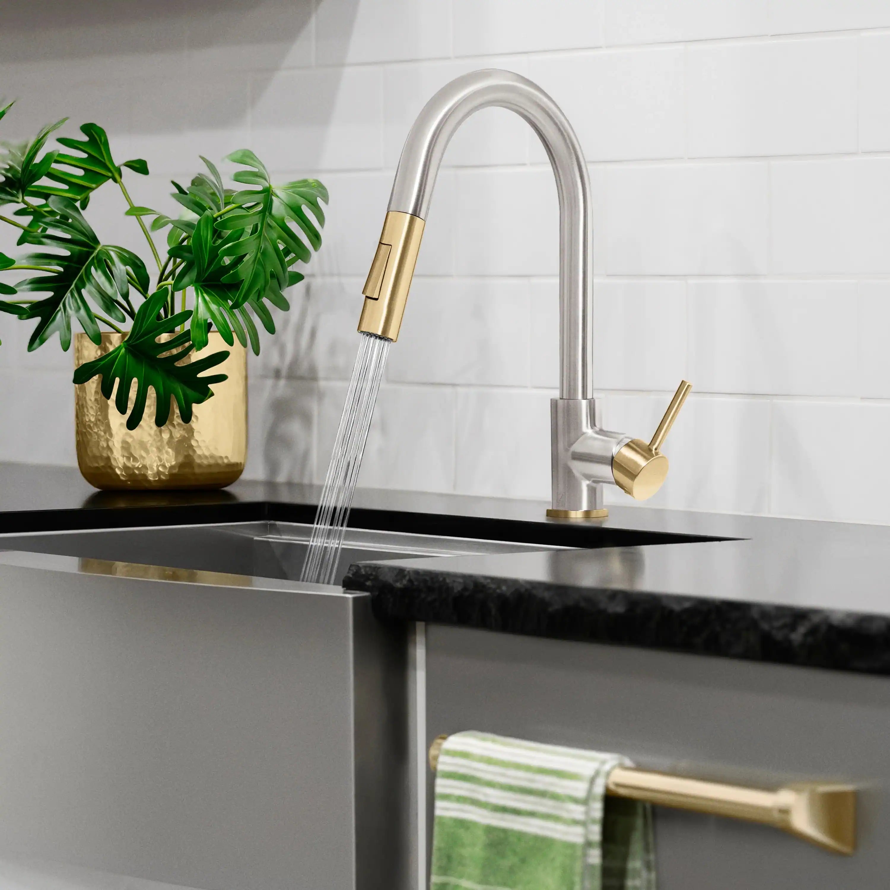 Pull-down single-handle kitchen faucet with brushed nickel spout and champagne bronze handle