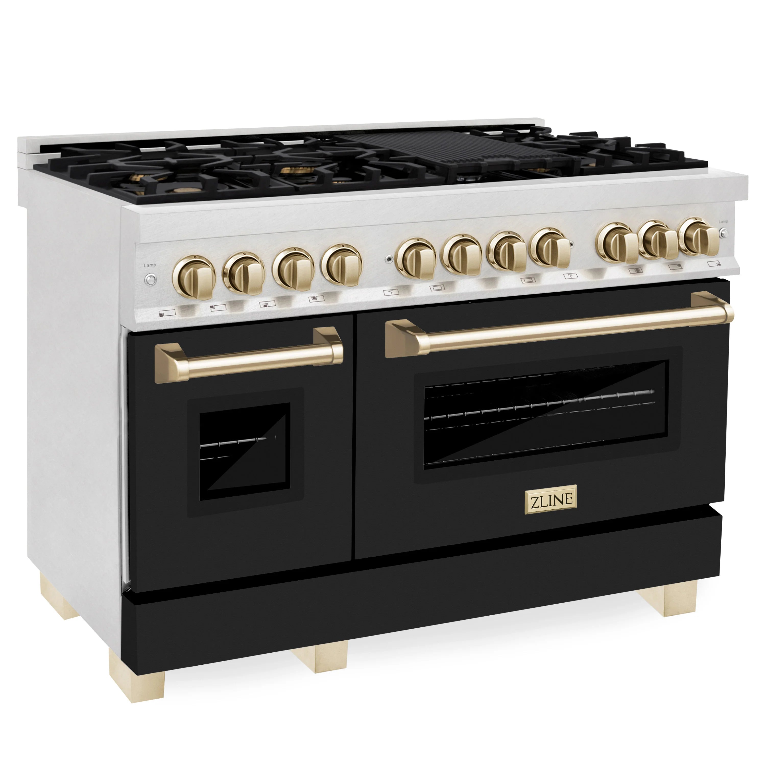 Stainless dual fuel range with black oven doors, gold handle bars, and control knobs