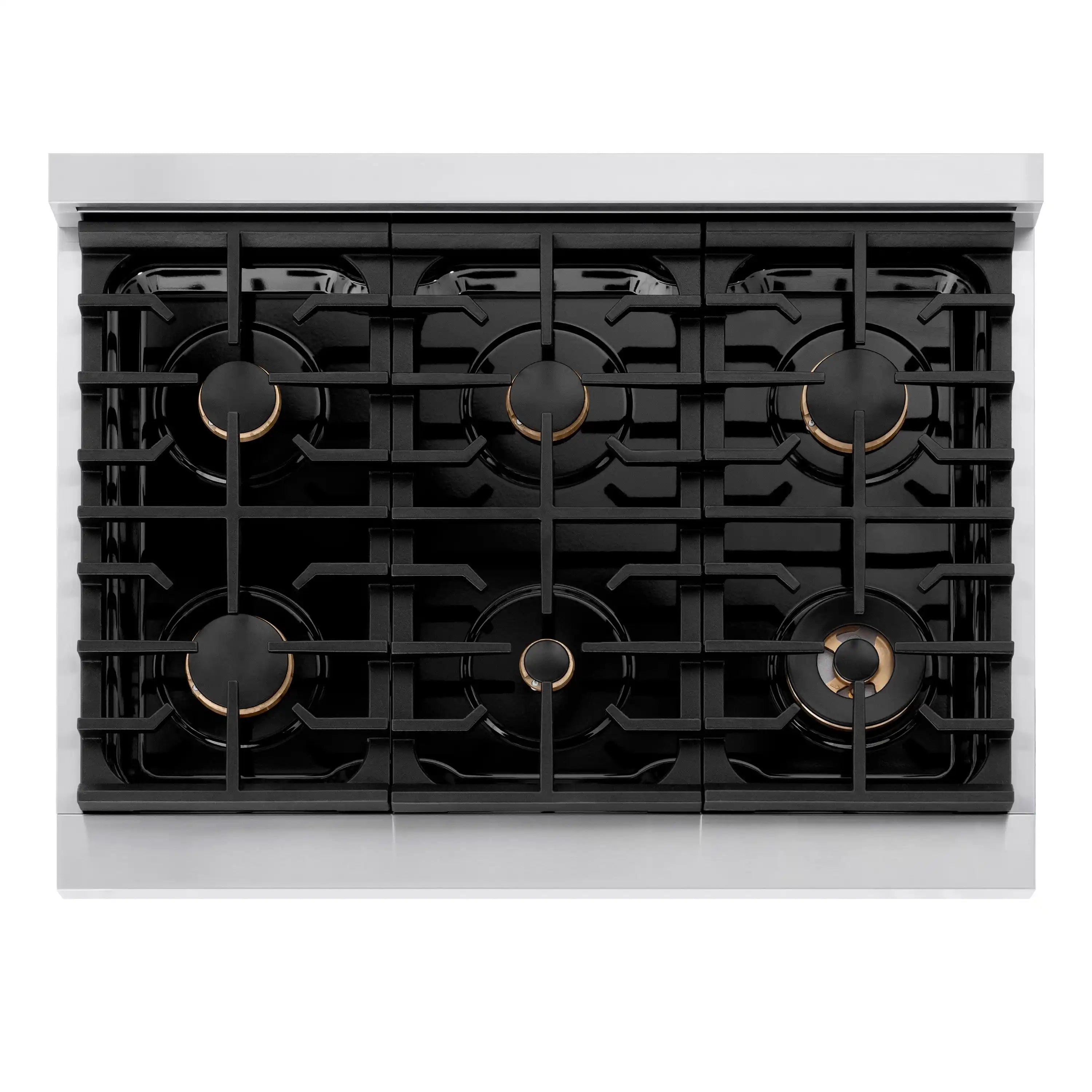 Black gas cooktop grates with brass-colored burner caps.
