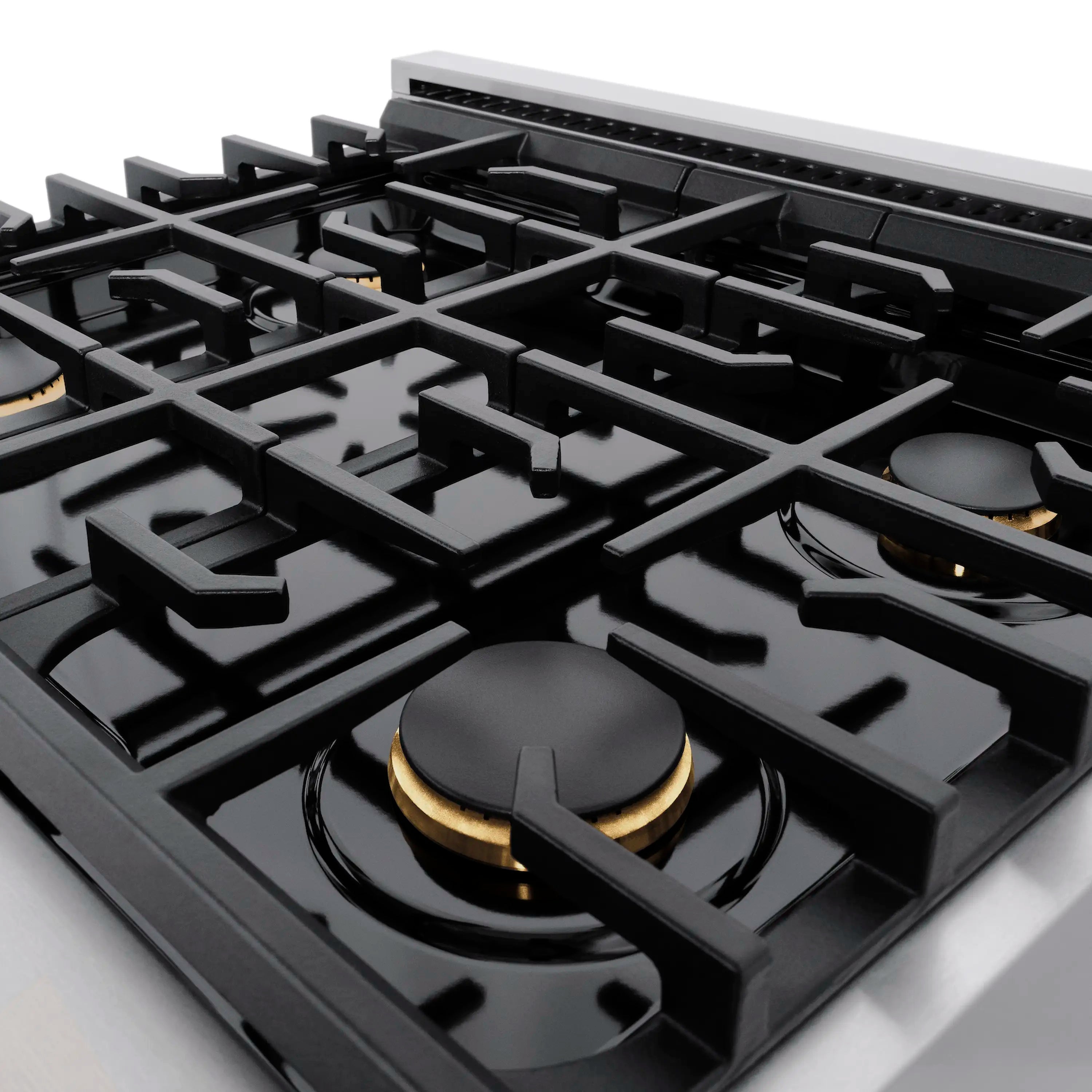 Close-up of four black gas grates with champagne bronze flame caps