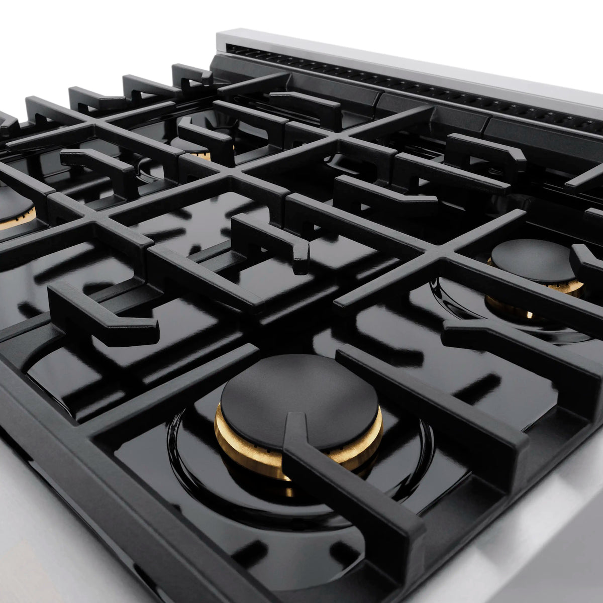 Black cast-iron burner grates with four round gas burners and gold accents