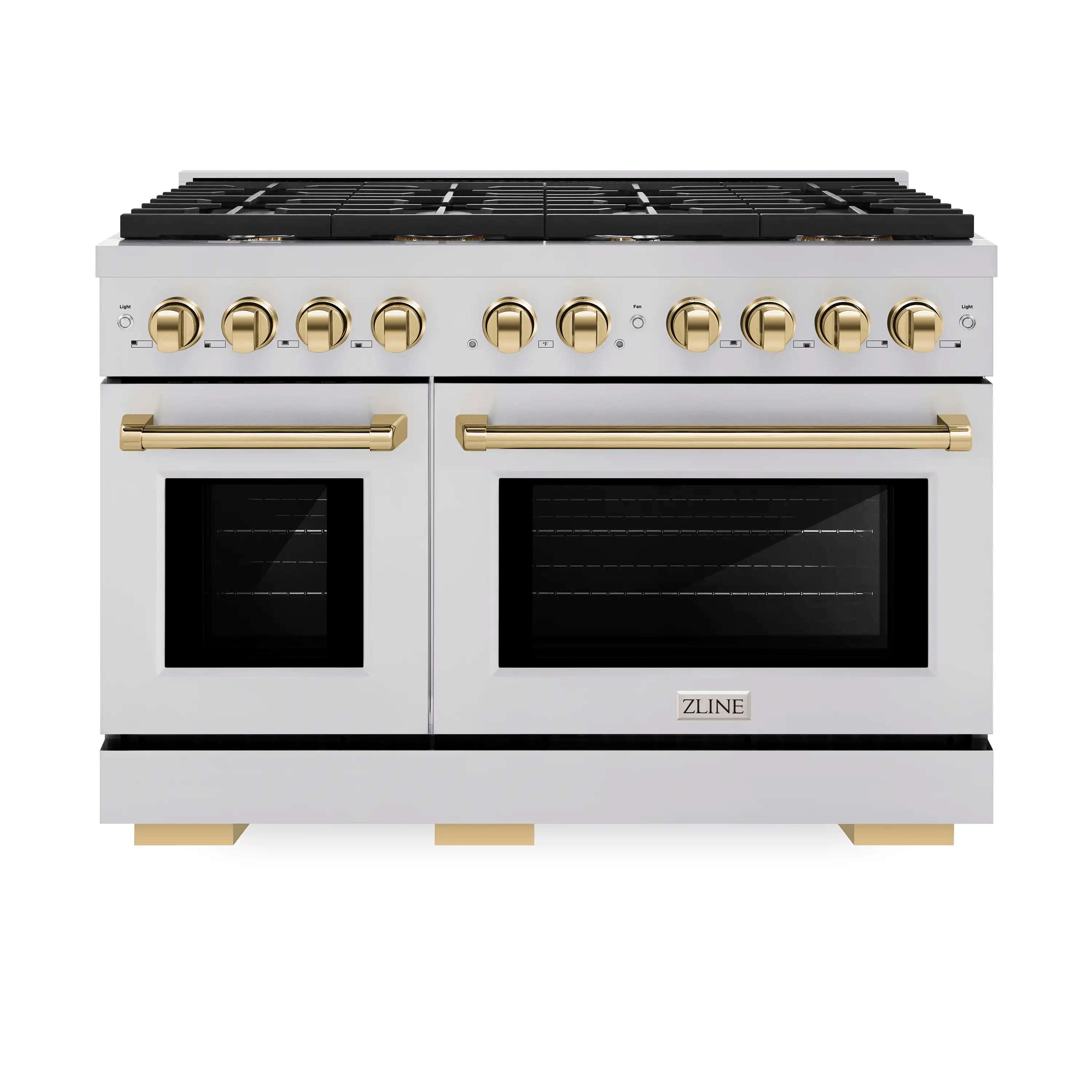 Stainless steel gas range with gold knobs, dual oven doors, and black cooktop grates
