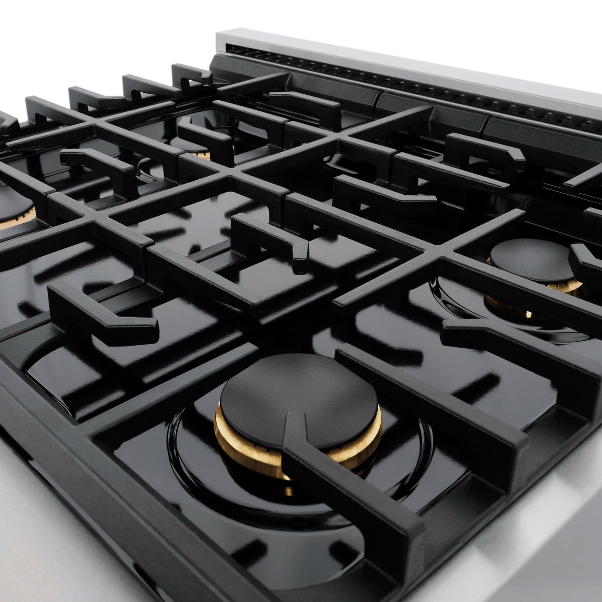Black burner grates with four burners and visible flame tips on cooktop