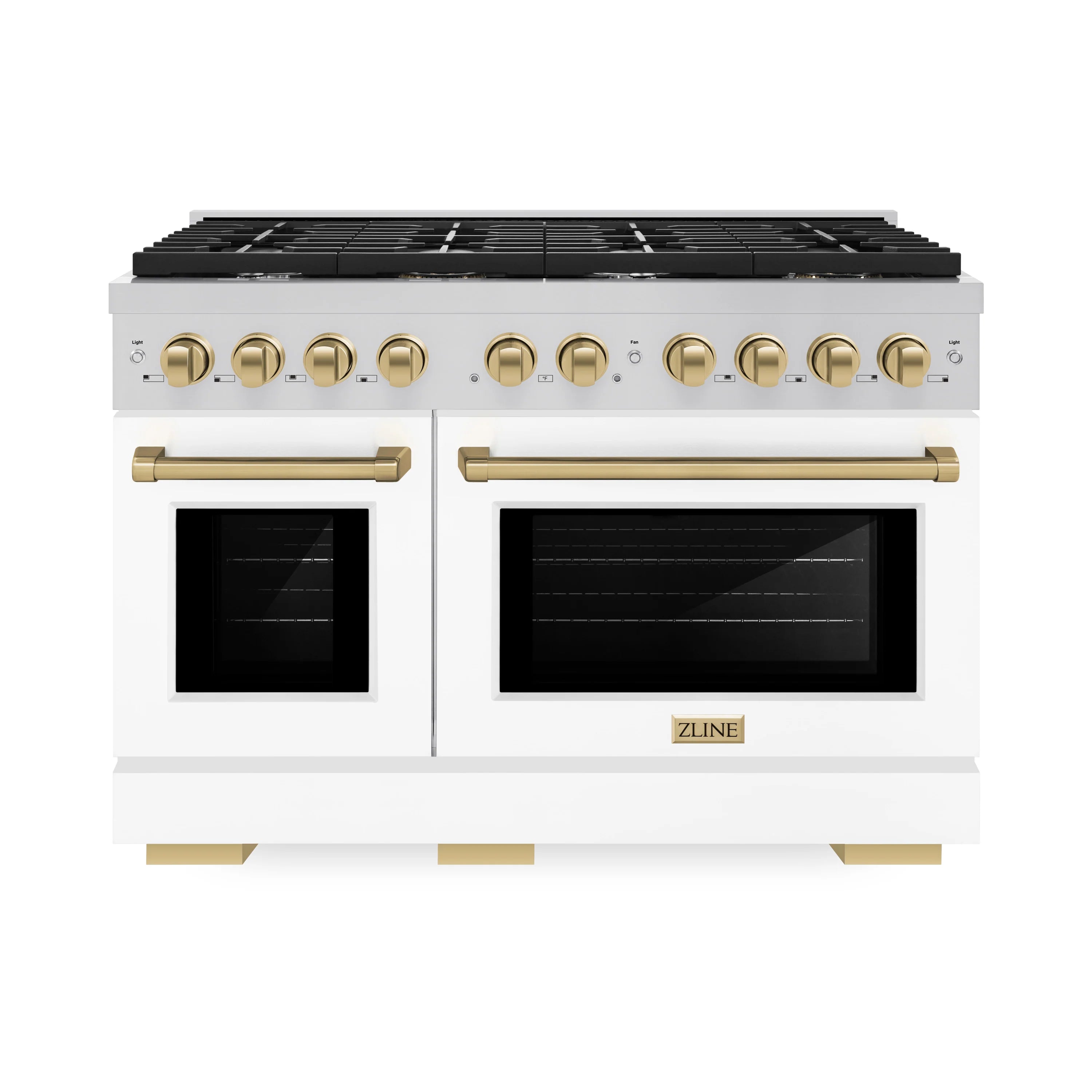 White gas range with two ovens, black grates, and champagne bronze control knobs