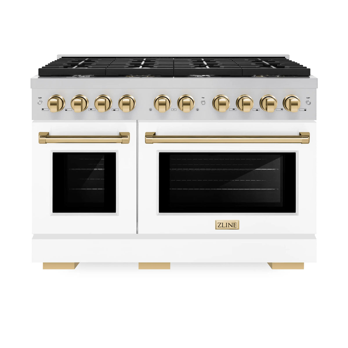 White gas range with dual oven windows, black cooktop grates, gold control knobs and pulls
