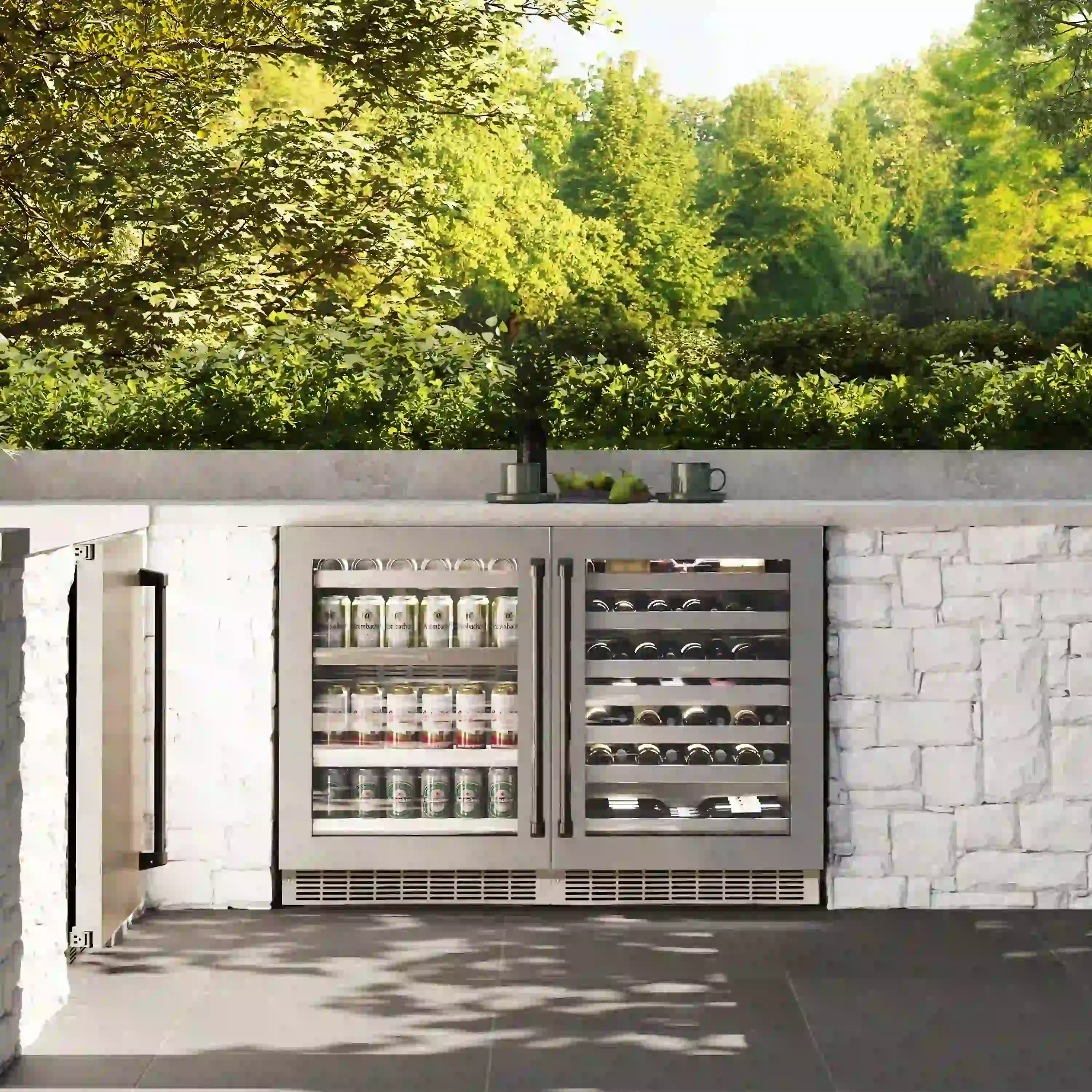 Outdoor built-in beverage fridge with dual glass doors, bottles and cans inside