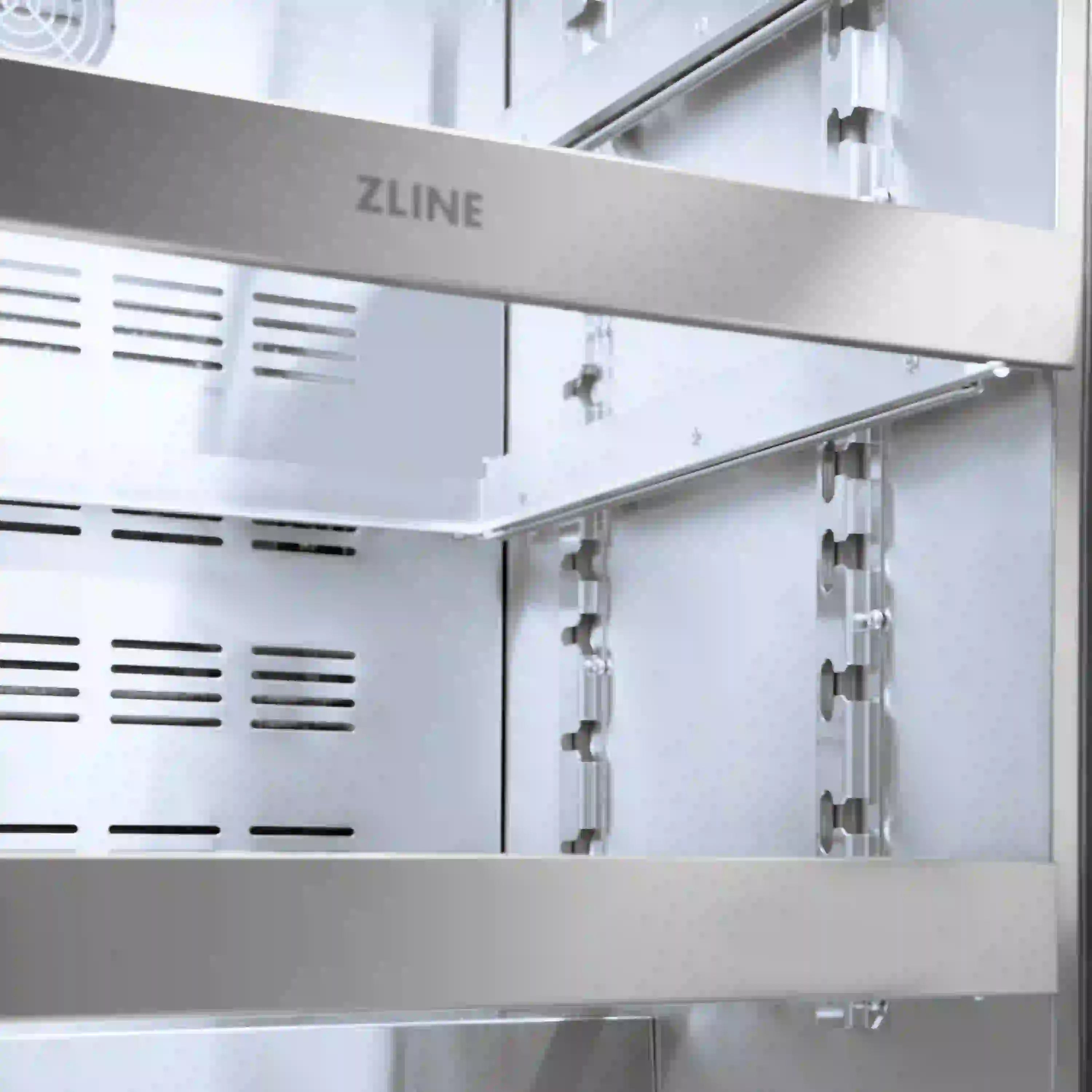 Interior side view of ZLINE wine cooler with adjustable shelves and door hardware