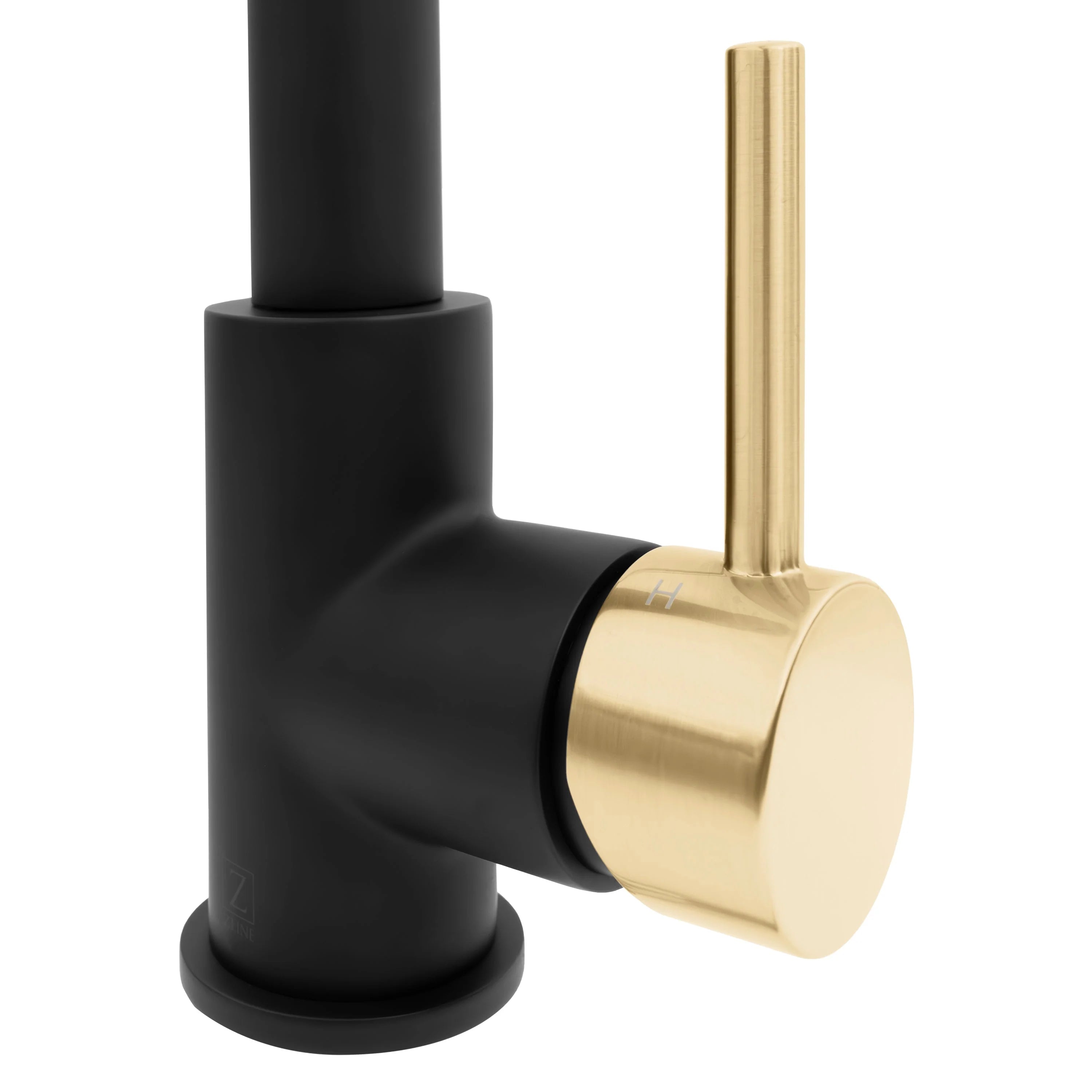 Close-up of matte black faucet body with champagne bronze outlet collar
