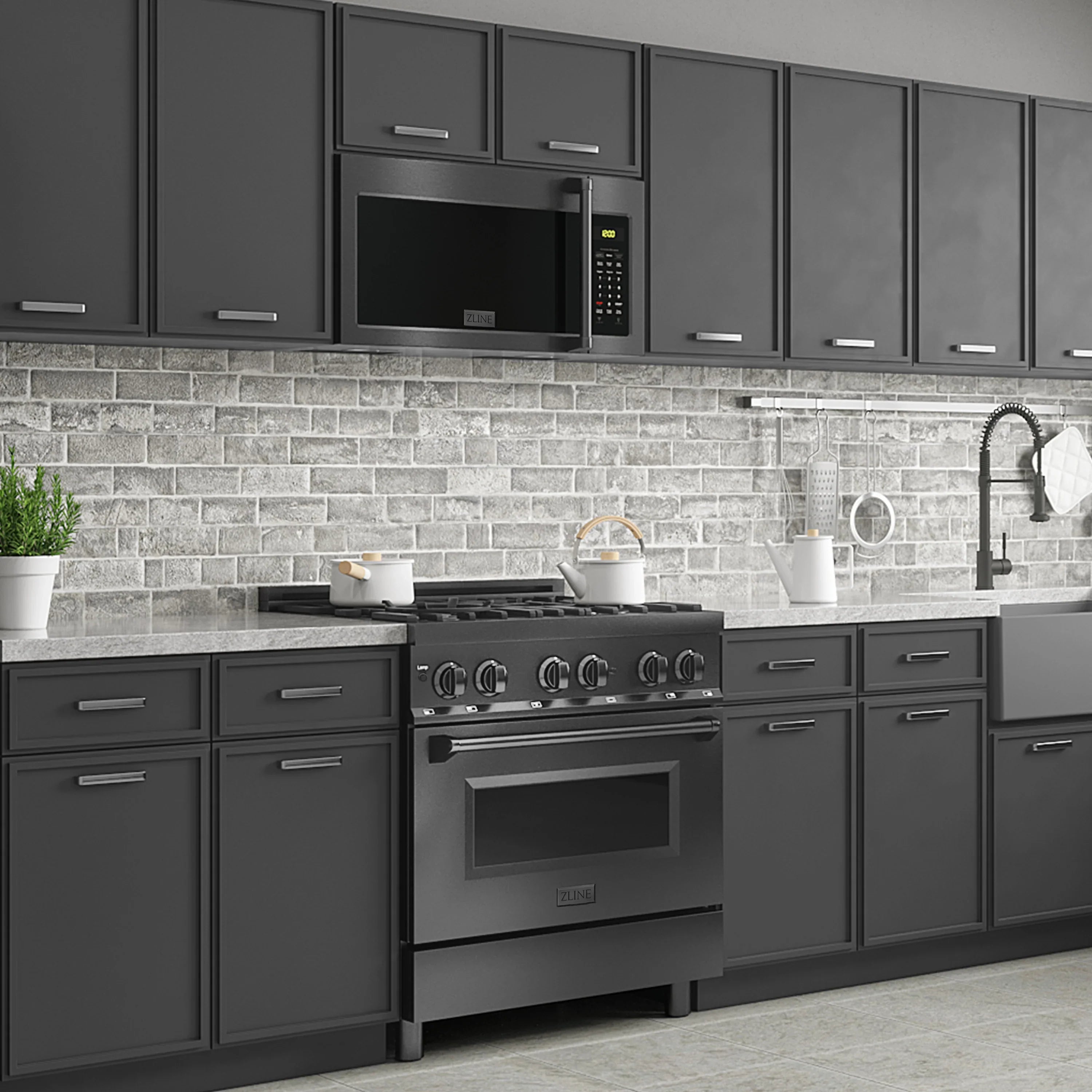 Black stainless gas range with knobs and over-the-range microwave hood above backsplash