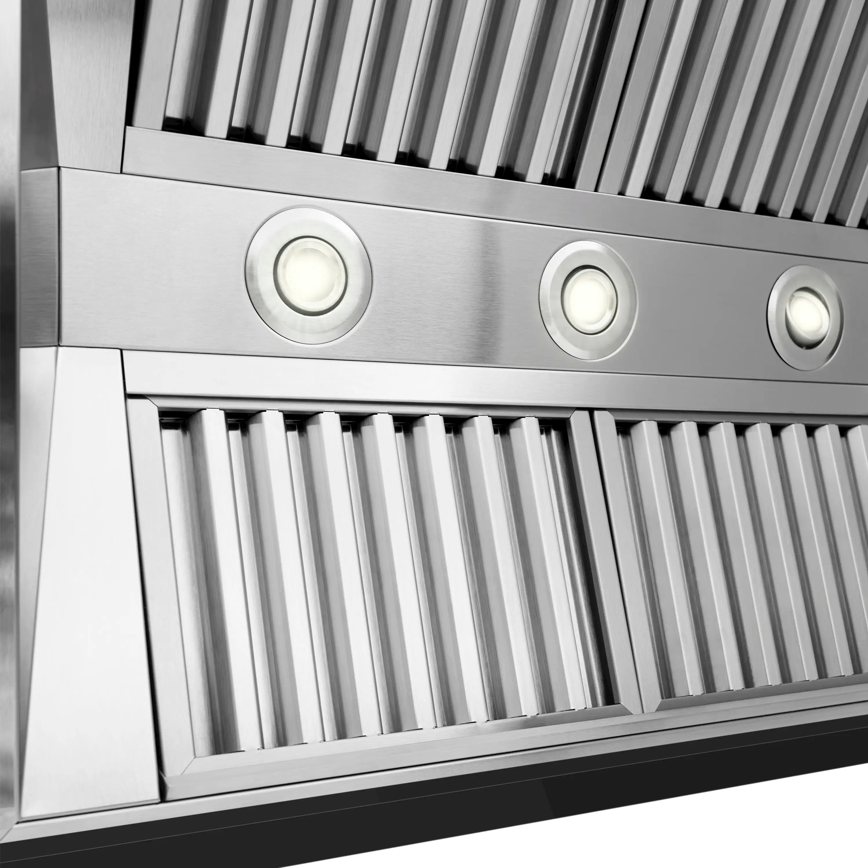 Stainless steel range hood front with three round indicator lights and vent slats