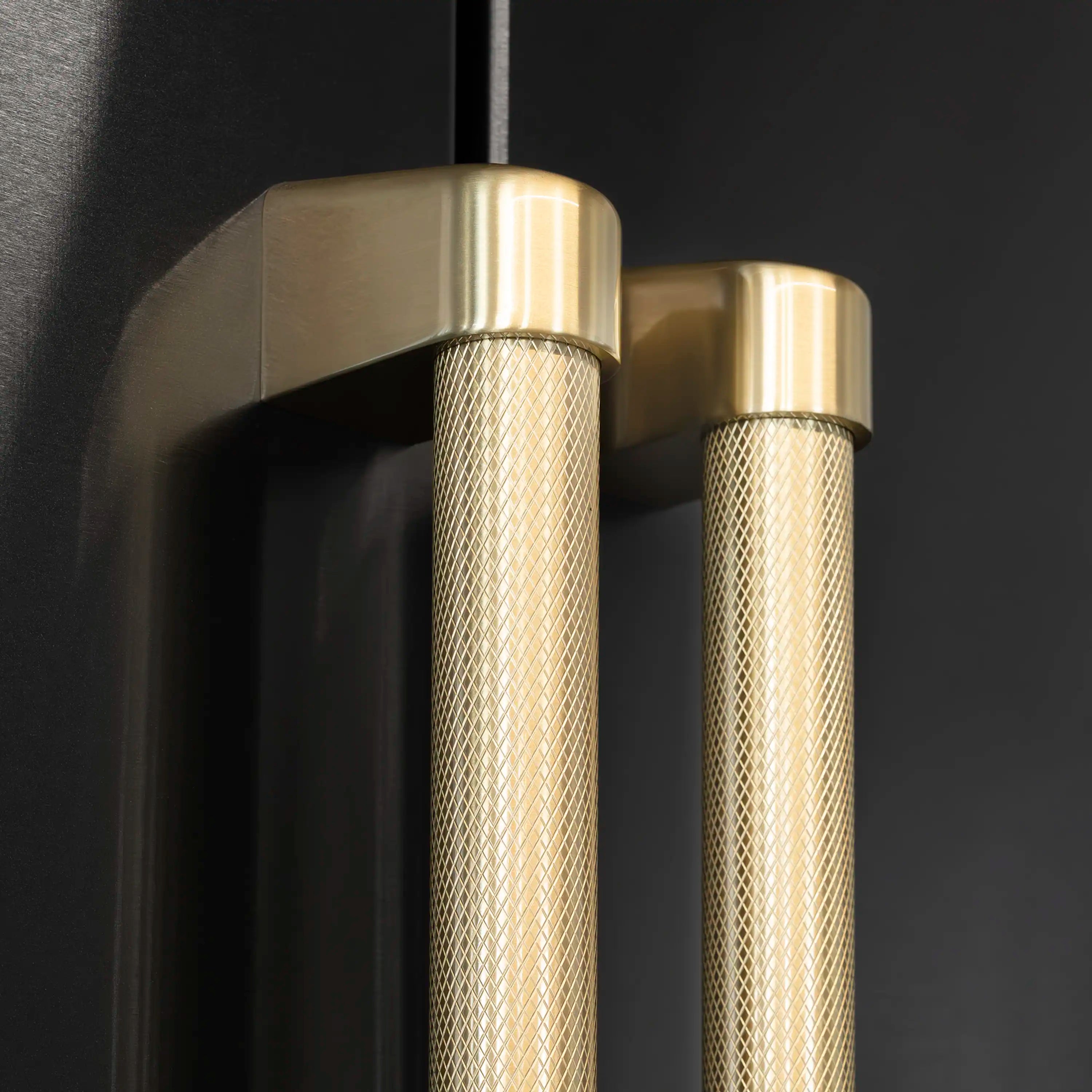 French door refrigerator handle pair, bronze helix pulls on black panel