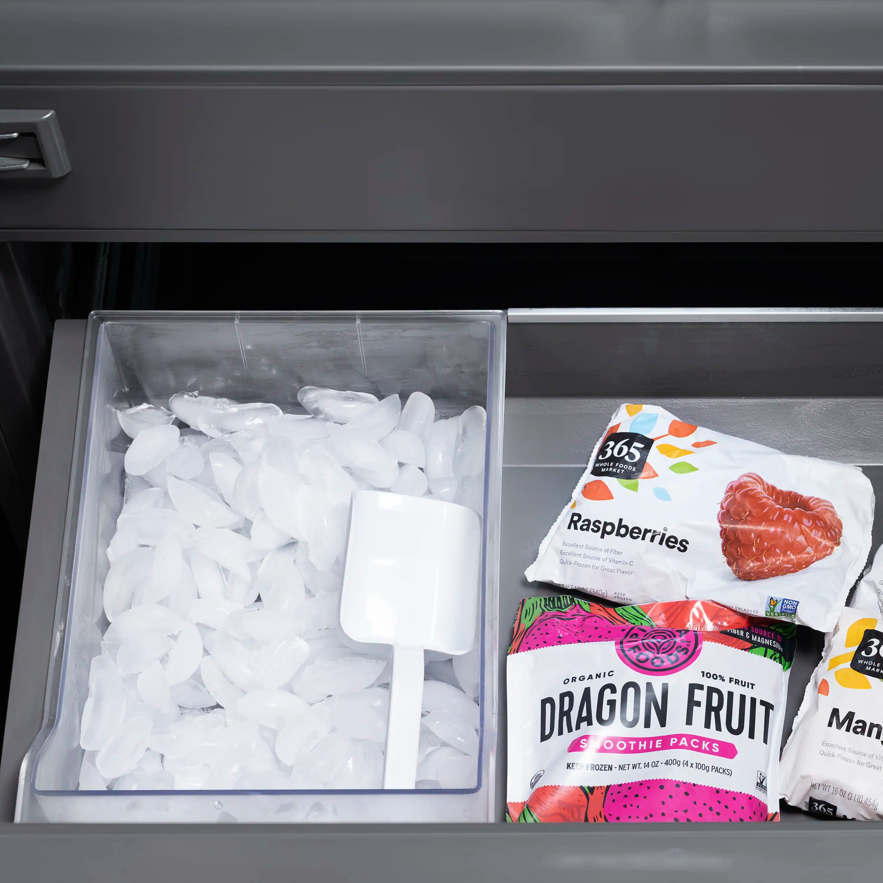 French door refrigerator freezer bin with frozen ice packs and food pouches