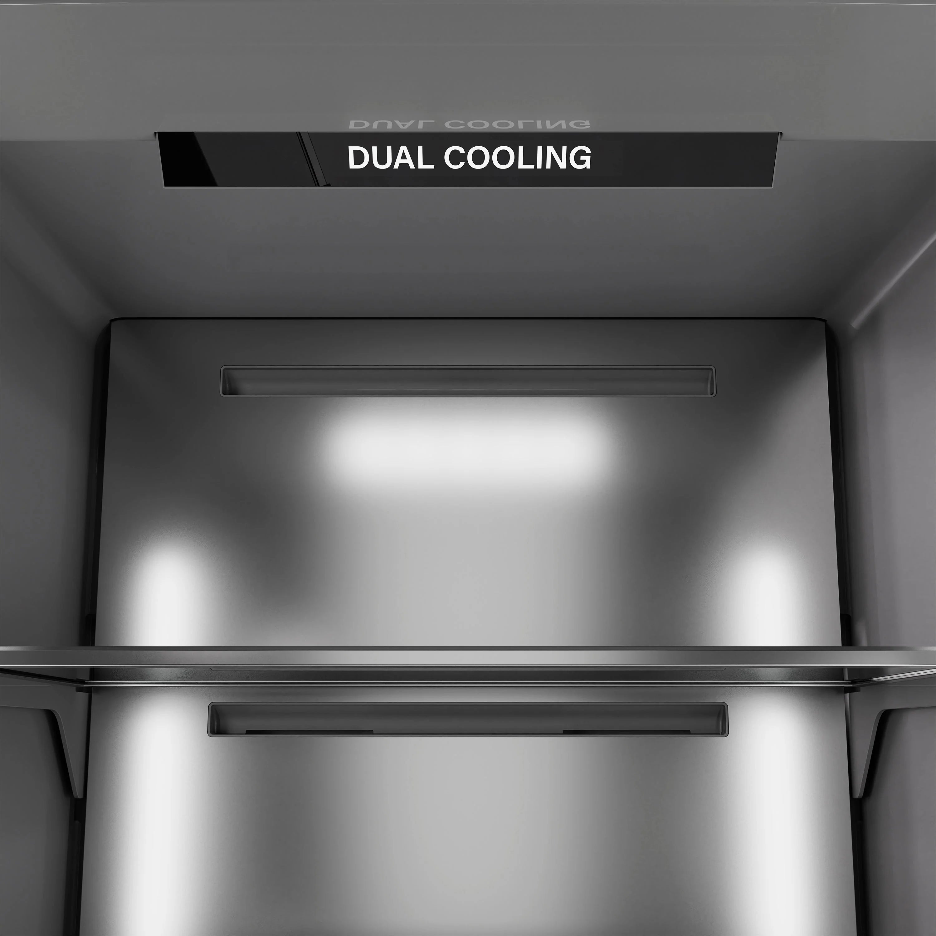 Refrigerator interior with top vent bar and Dual Cooling label above the compartment