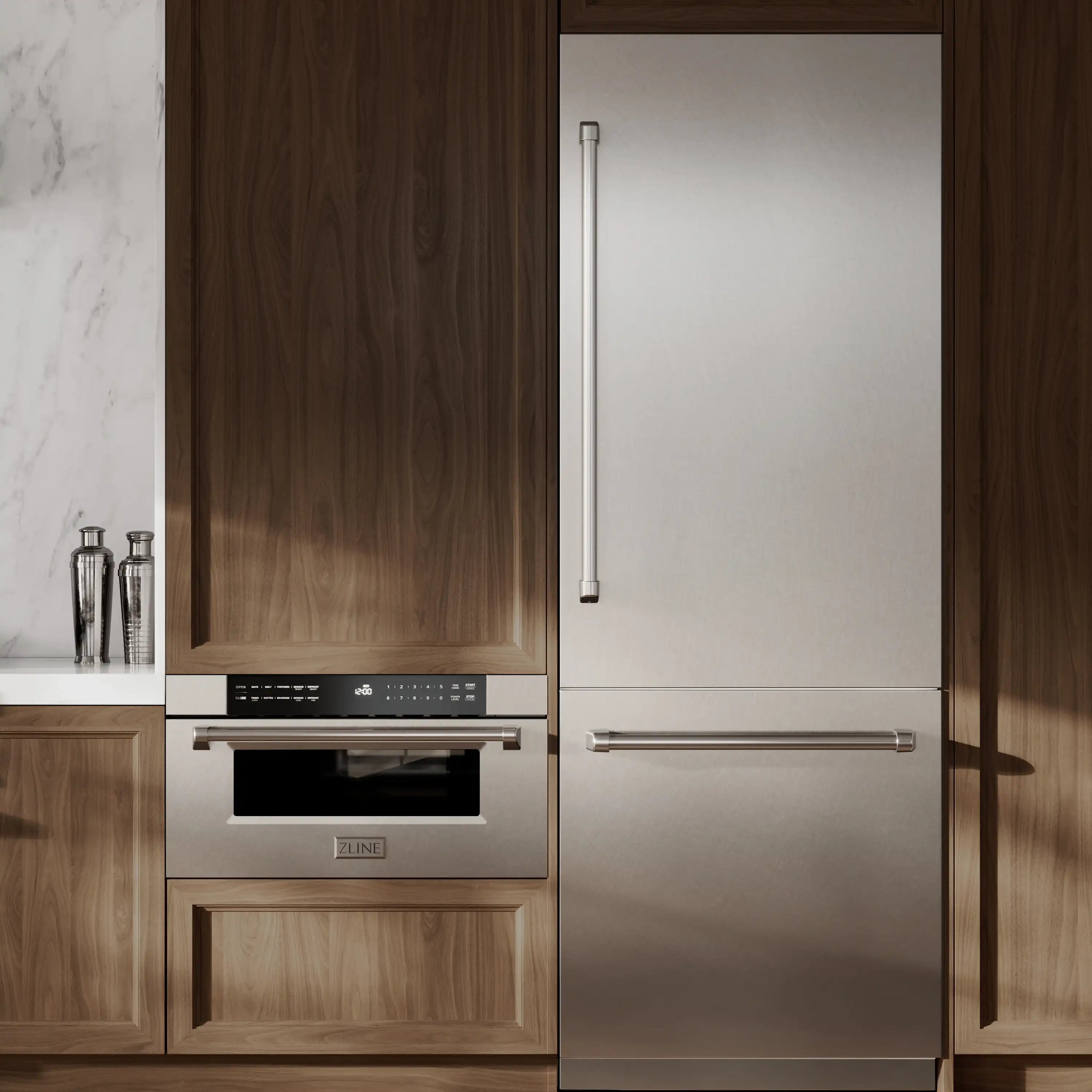 Built-in refrigerator with satin stainless doors and water dispenser in kitchen cabinetry