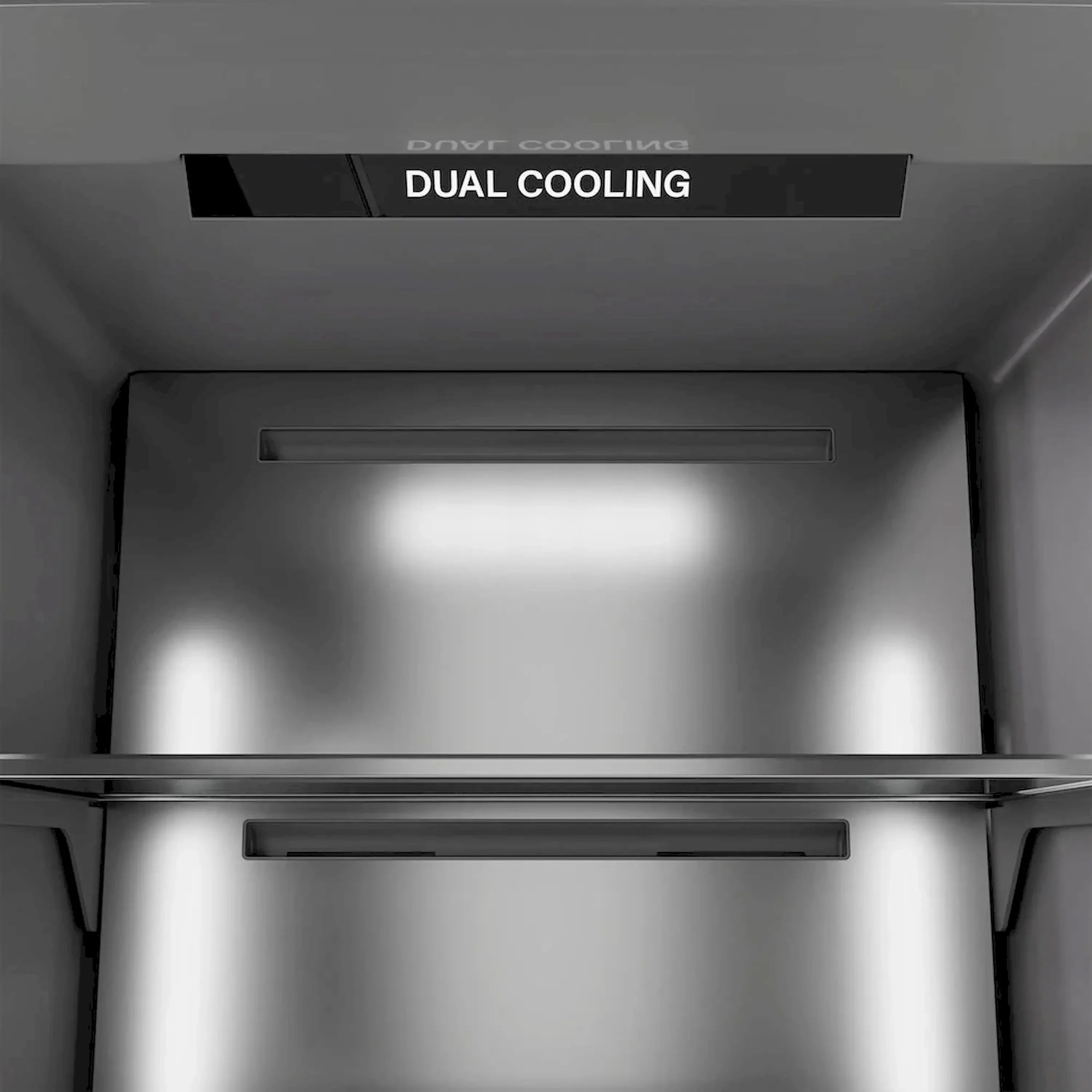 Panel-ready refrigerator/freezer top compartment with Dual Cooling label
