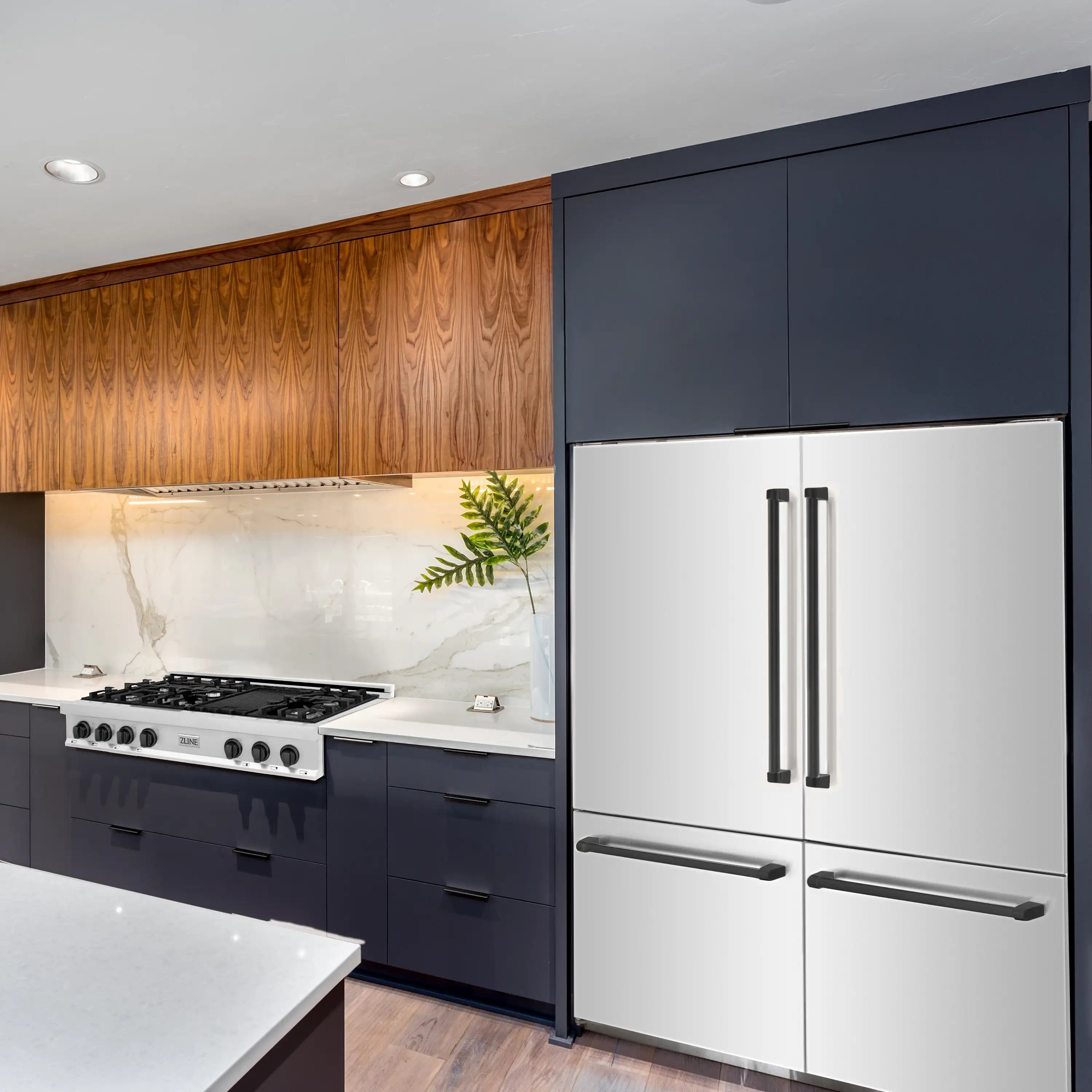 Built-in French door bottom-freezer refrigerator in stainless steel with black trim
