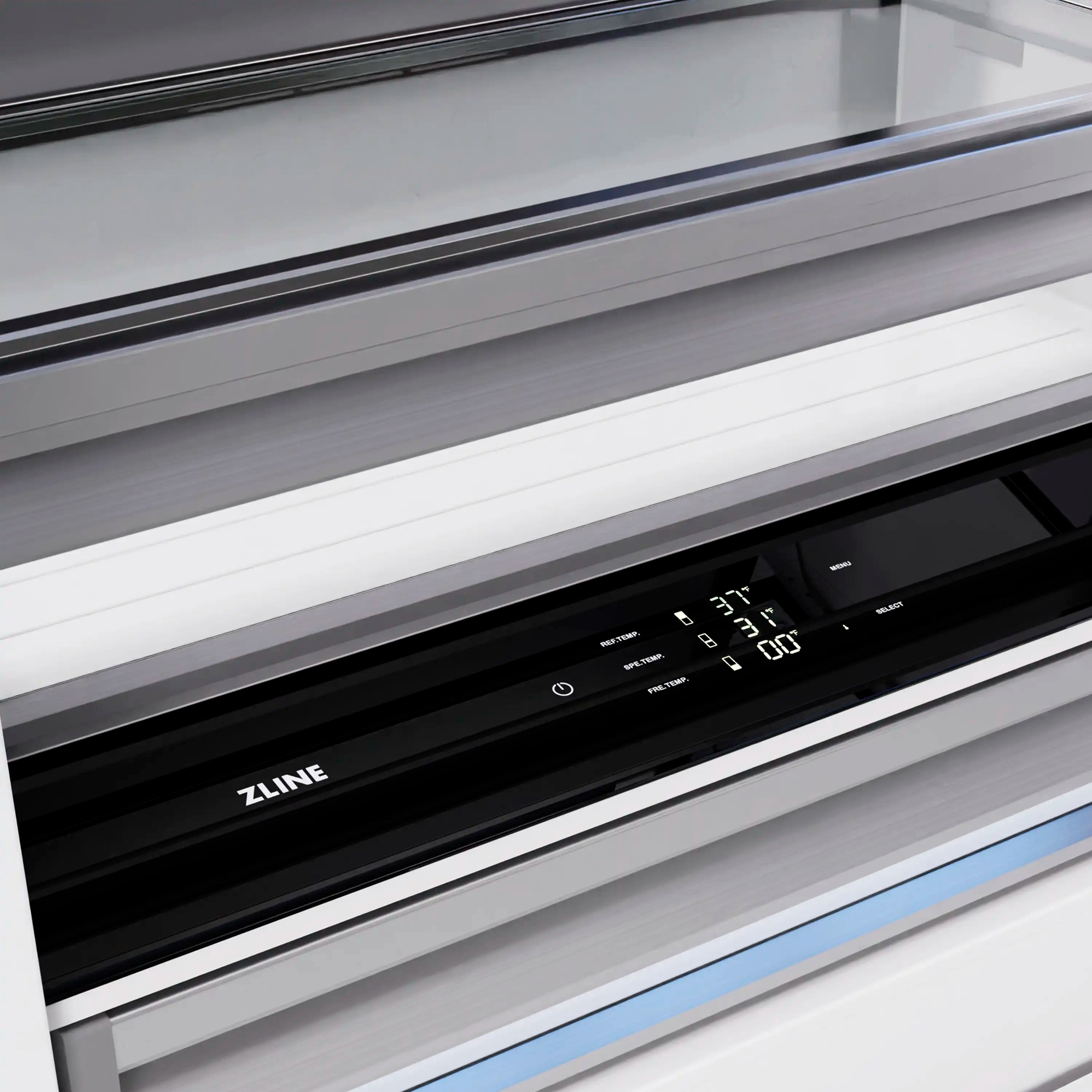 Stainless steel bottom freezer dispenser area with black control strip and ZLINE logo